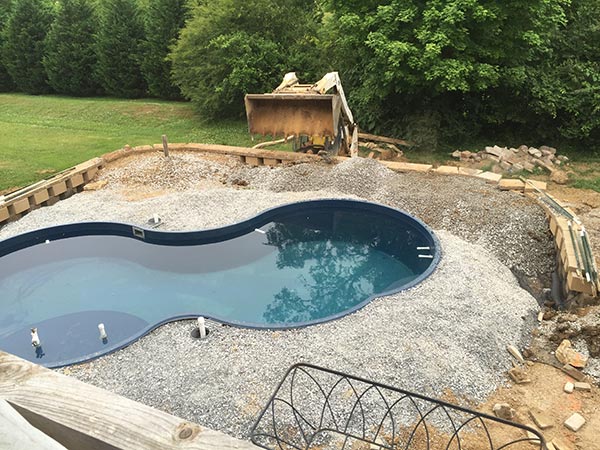 fiberglass pool backfilled with gravel