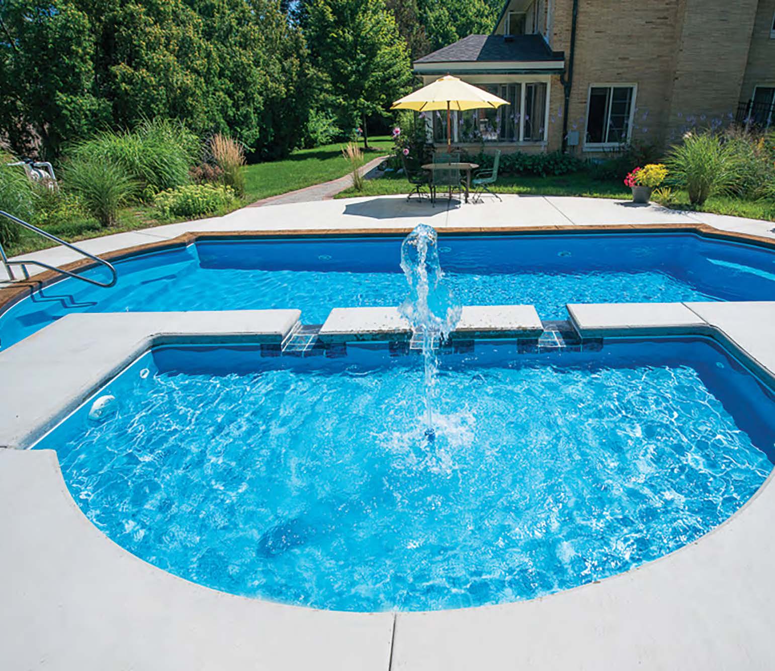 Photo of installed wet deck with Infinity Edge feature Turtlemodel from Thursday Pools
